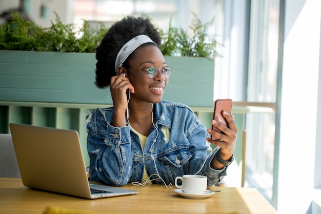 Portrait of a woman using her phone