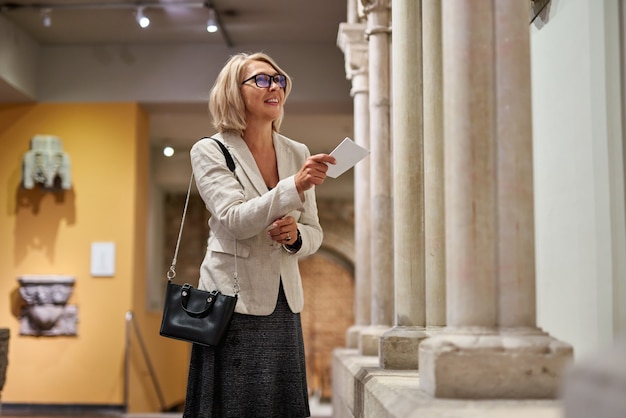 Portrait of a woman visiting historical museum