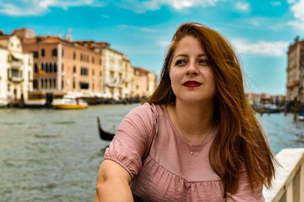 portrait woman walking in the city of Venice