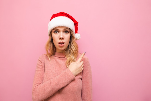 portrait woman wearing Santa hat