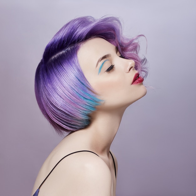 Portrait woman with bright colored flying hair