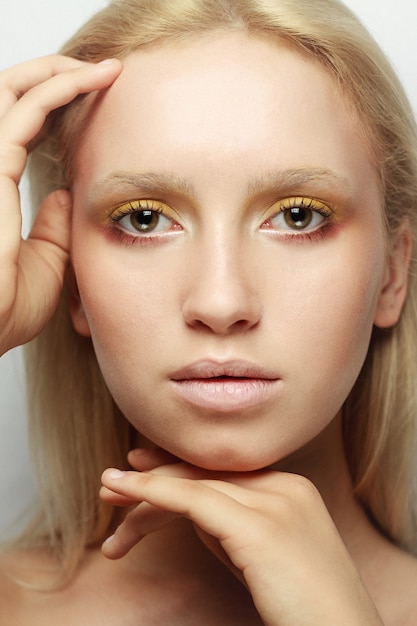 Portrait of a woman with bright makeup