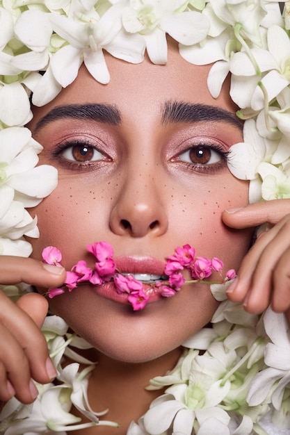 Portrait of woman with flowers