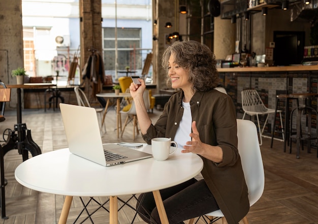 Portrait woman with laptop working