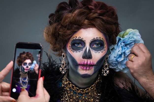 Portrait of a woman with a skull makeup