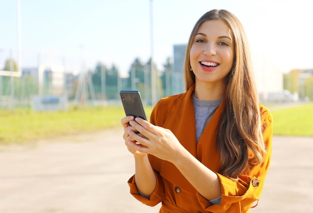 Portrait of a woman with a smartphone