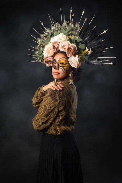 Portrait of a woman with sugar skull makeup Catrina portrait Halloween and day of the dead makeup