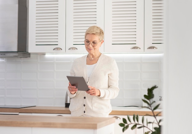 Portrait woman with tablet working