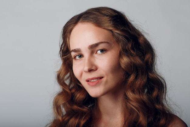 Portrait of woman with wavy hair