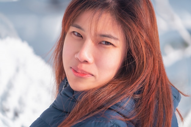 Portrait of woman with winter clothing