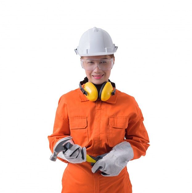 Portrait of a woman worker in Mechanic Jumpsuit is holding hammer isolated on white background