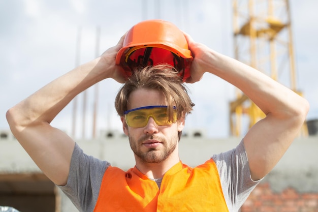 Portrait of worker man at construction site portrait of construction worker outdoor