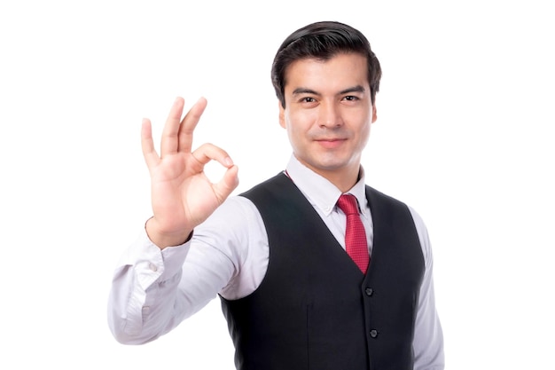 Portrait working Asian business handsome man in shirt and tie showing ok gesture hand standing and looking at camera isolated on white background with copy space business concept