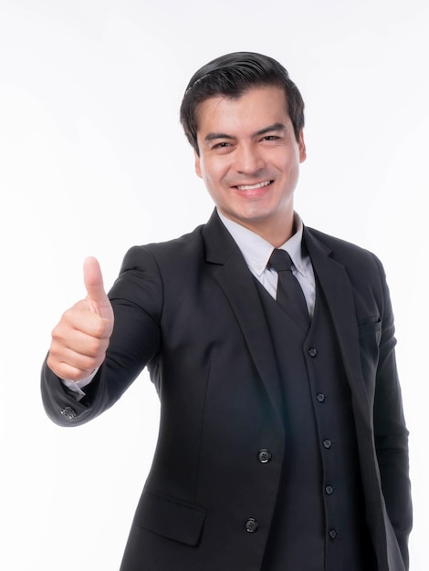 Portrait working Asian business handsome man ware suit giving a thumb up hand on white background with copy space business concept