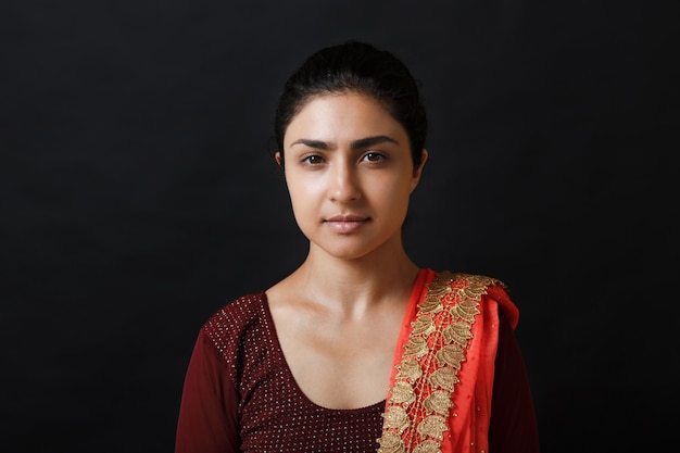 Portrait of young adult indian woman in sari