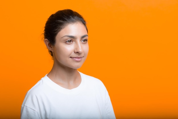 Portrait of young adult indian woman in Tshirt