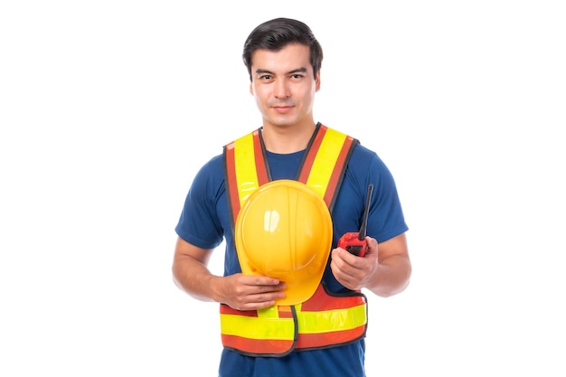 Portrait young architect man engineering holding yellow helmet and megaphone in hand He standing arms crossed isolated on white background with copy space