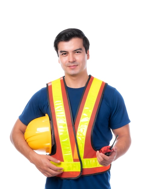 Portrait young architect man engineering holding yellow helmet and megaphone in hand He standing arms crossed isolated on white background with copy space