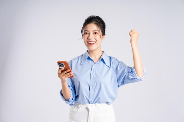 Portrait of young Asian businesswoman isolated on white background