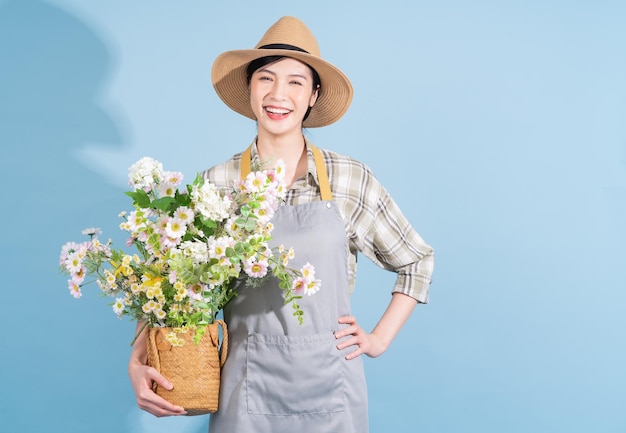 Portrait of young Asian female farmer