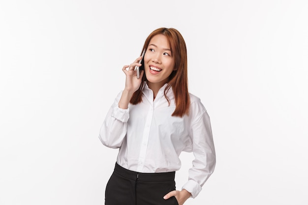 Portrait of a young asian female in office