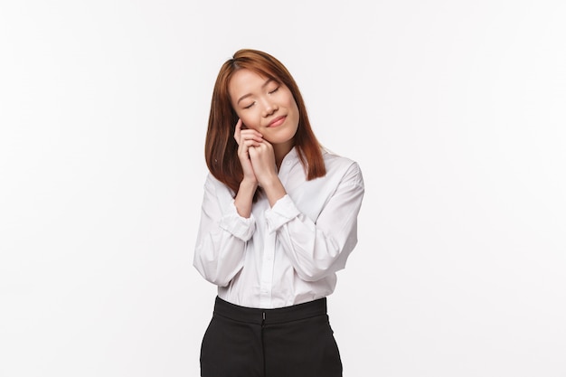 Portrait of a young asian female in office