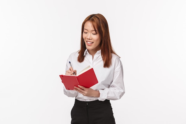 Portrait of a young asian female in office