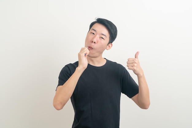 portrait young Asian man brush teeth on white background