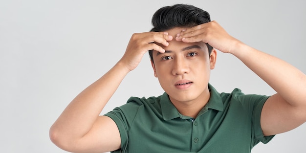 Portrait of young asian man isolated on white background