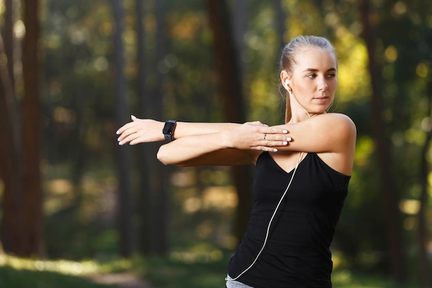 Portrait of young athletic woman wearing