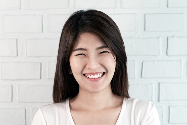 Portrait of young attractive asian brunette woman