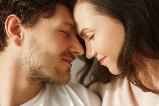 Portrait of young beautiful couple showing their love