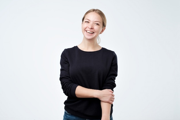 Portrait of young beautiful cute cheerful girl smiling looking at camera