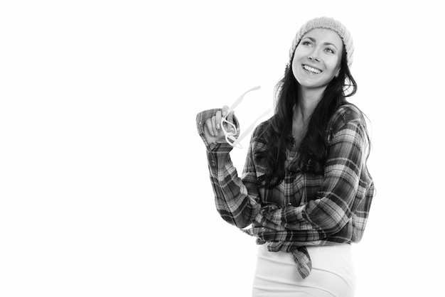 Portrait of young beautiful hipster woman isolated on white in black and white