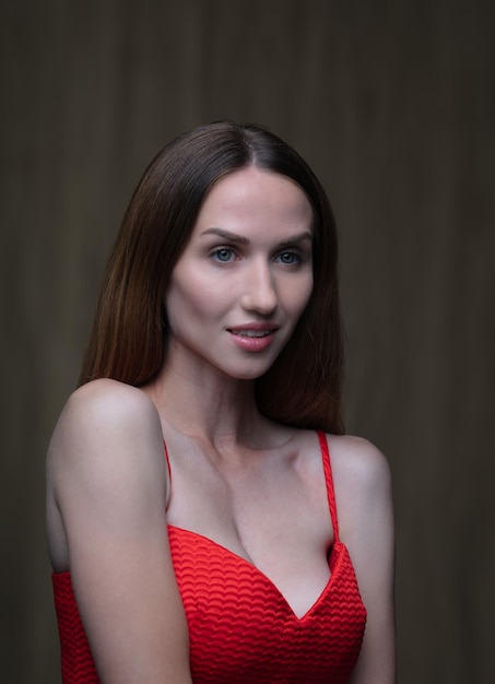 portrait of a young beautiful woman on a blurred background