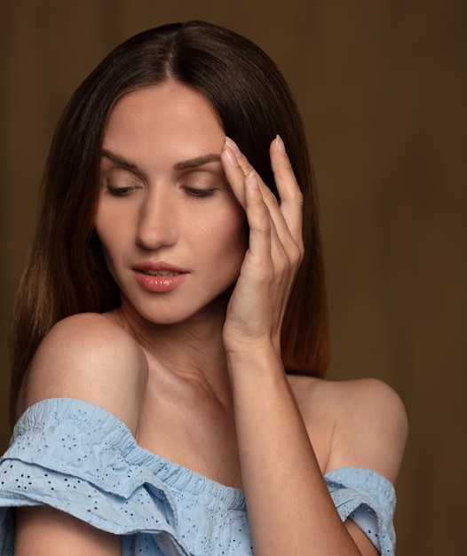 portrait of a young beautiful woman on a blurred background