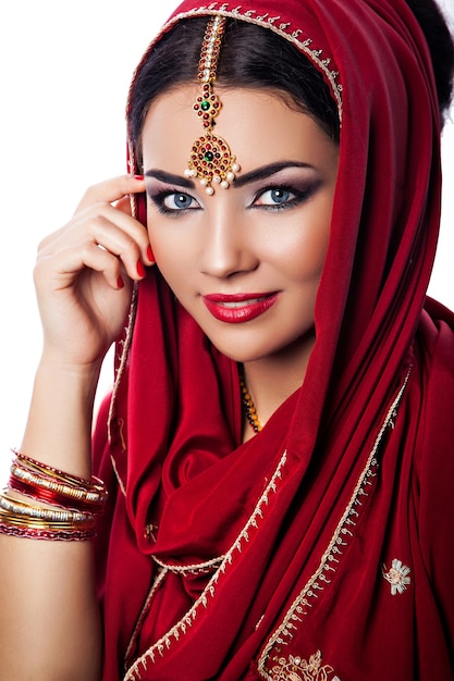 Portrait of young beautiful woman in indian style, fashion look