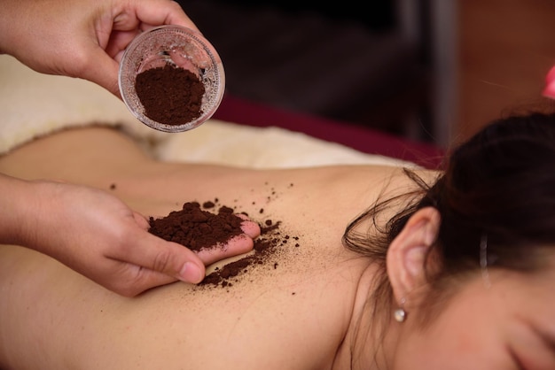 Portrait of young beautiful woman in spa environment