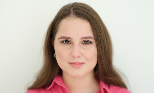 Portrait of young beautiful woman with dark long hair