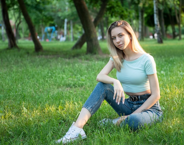 Portrait of a young blonde taken in the light of sunset