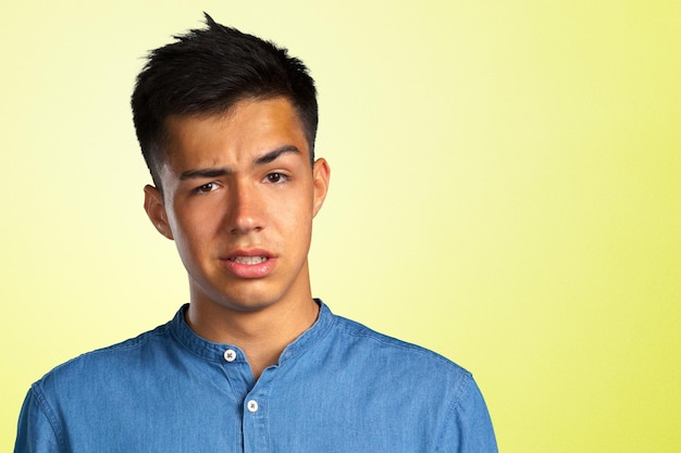 Portrait of young bored man