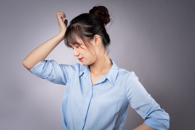 Portrait of young businesswoman on white background