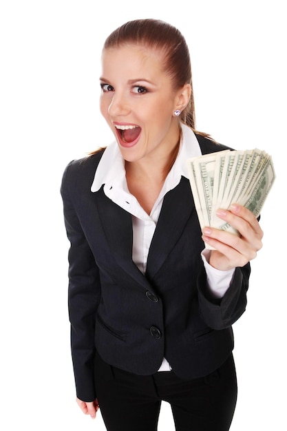 Portrait of young businesswoman with pile of money