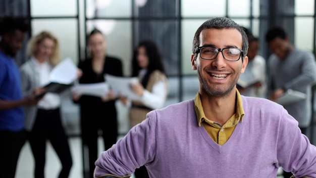 Portrait of a young casual man with glasses In everyday clothes