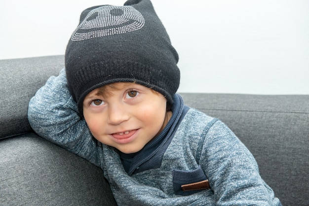 Portrait of a young child with a winter hat