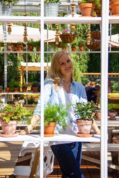 Portrait of a young confident woman enjoying life outdoors in warm weather