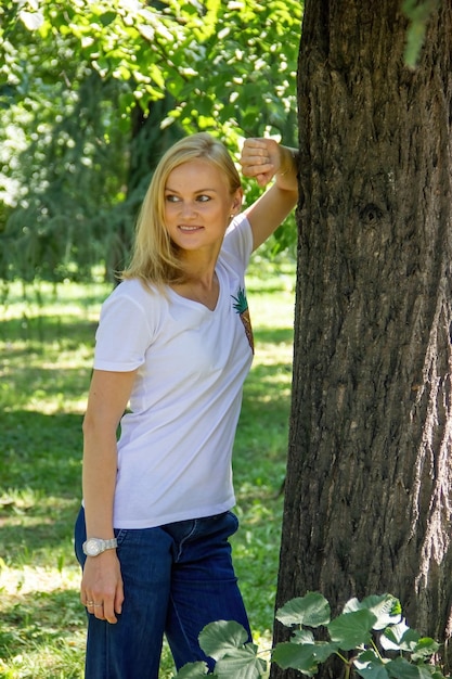 Portrait of a young confident woman enjoying life outdoors in warm weather