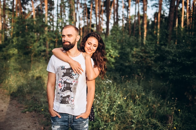 portrait of a young couple in the forest