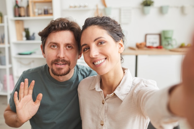 Portrait of young couple smiling