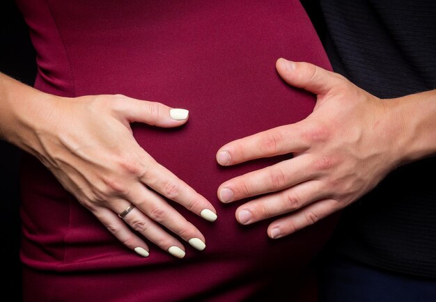 Portrait of a young couple waiting for a baby